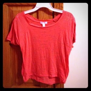 light pink/orange short top. see through