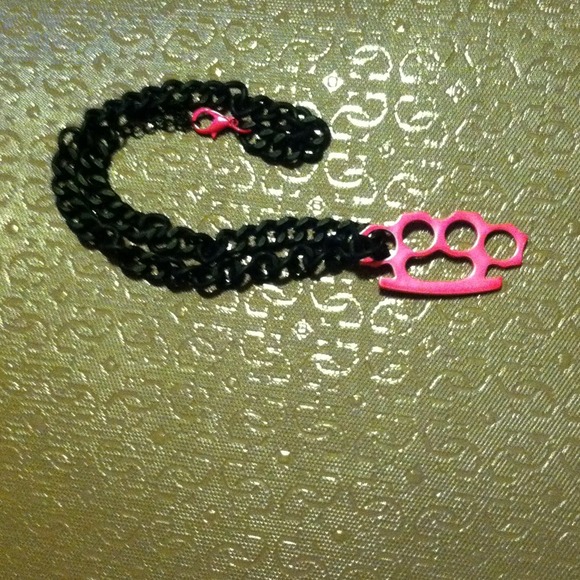 Neon mini pink brass knuckles necklace!