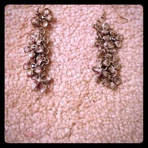 pair of silver dangley flower earrings. NEVER WORN