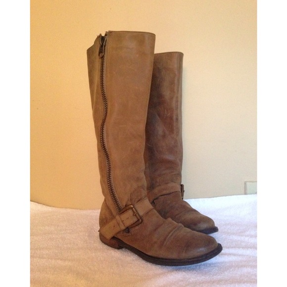 Riding boots with zipper and buckle strap