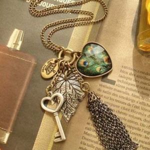 NWOT Peacock Key & Tassel Necklace