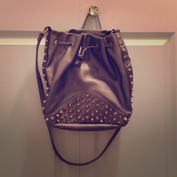 ❌Sold❌Cross body spike purse amazing condition.