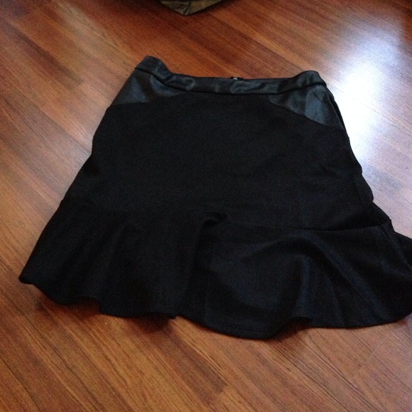 Cute black skirt with peplum bottom
