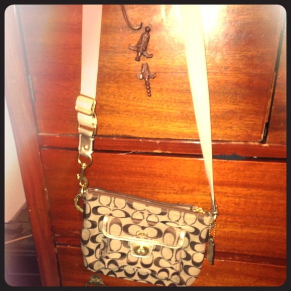gently used tan and gold coach cross body!