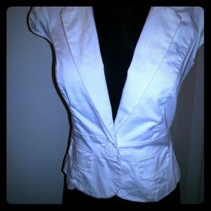Solid white button up top with padded shoulders