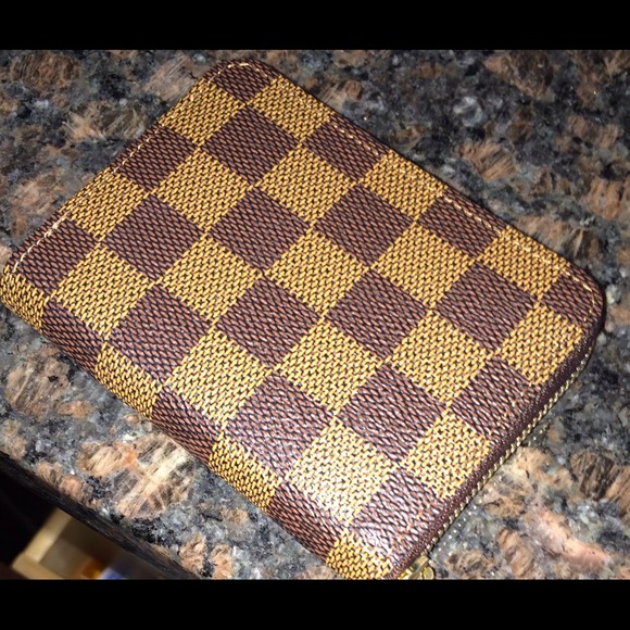 #### SOLD ####Guaranteed authentic lv zippy coin