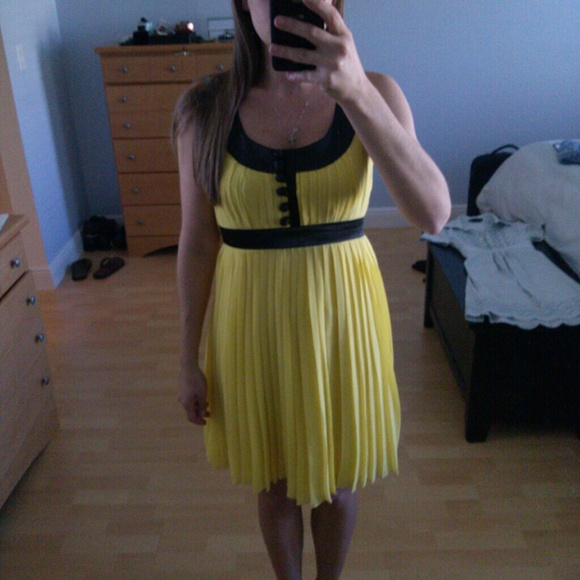 Black and yellow pleated dress