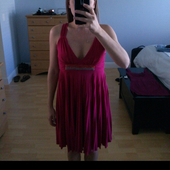 Raspberry pleated dress with beaded detail