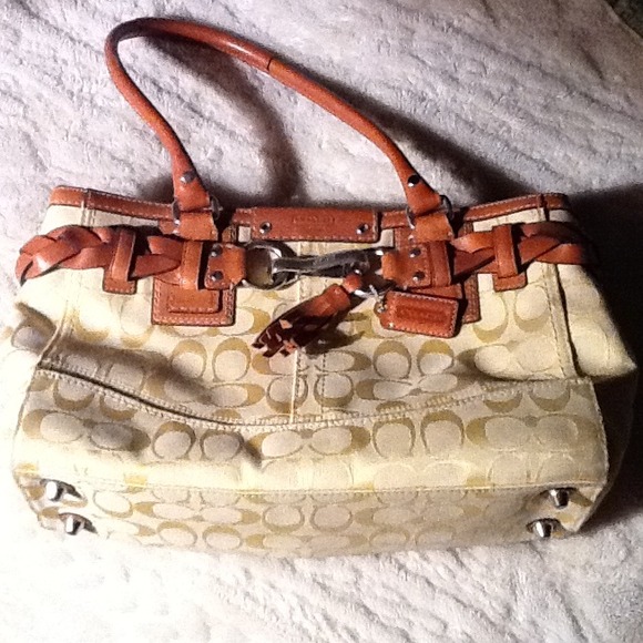 Authentic Coach purse. Rarely used leather accents