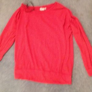 Minimally worn simple orange shirt.