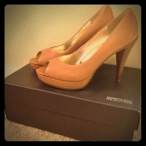 Tan peep-toe pumps