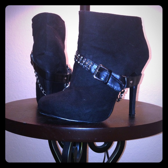 Studded and chained bootie heels