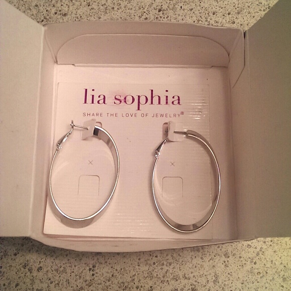 Never worn Lia Sophia earrings!