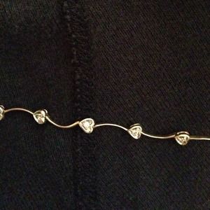 10K Gold and diamond heart bracelet.