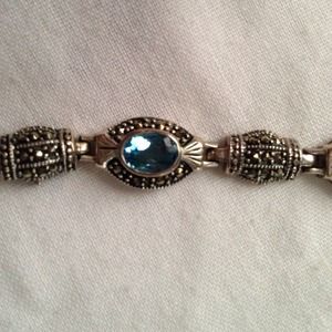SS and Blue Topaz bracelet and earring set.