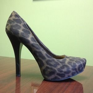 Carlos Santana leopard heels