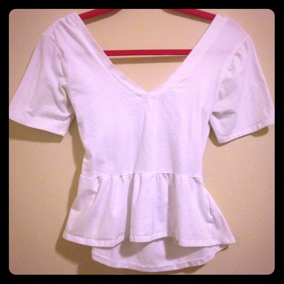 Peplum top with cross back