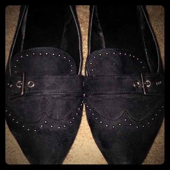 Black studded flats.