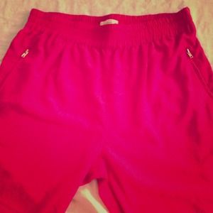 Pink pants/gold zipper