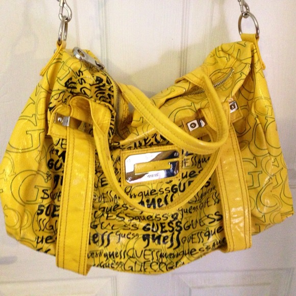 Yellow & black GUESS bag with adjustable strap.