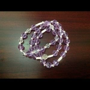 Three piece purple bracelet.