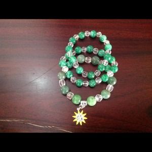 Three piece green bracelet.