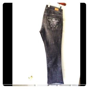 Grey rustic boot cut jeans