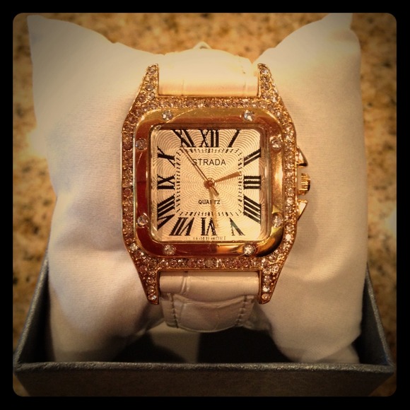 Strada white leather watch.
