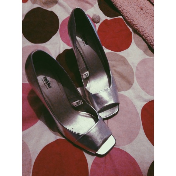 Silver peep toe heels.