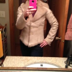 Genuine rabbit skin, fur- lined jacket.