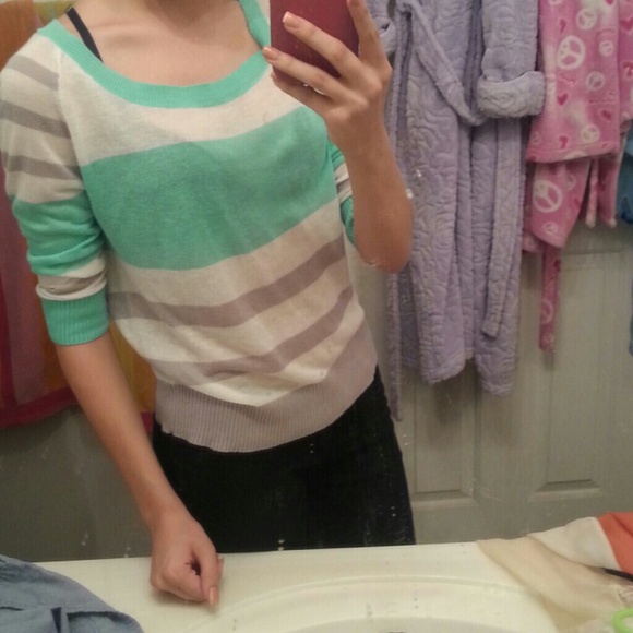 Teal, gray, and white sweater