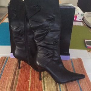 Patent leather boots and black heels on hold