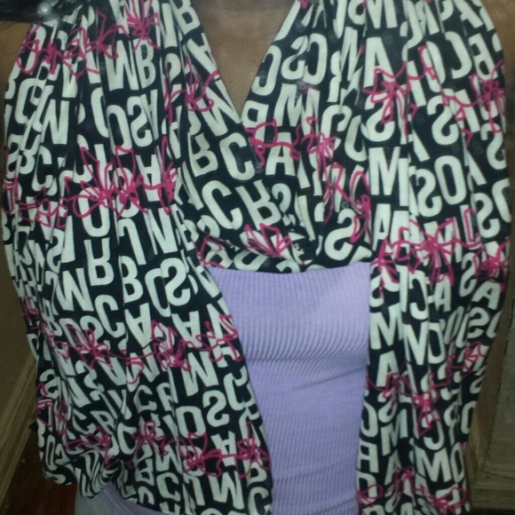 A really soft scarf with pink bow detailing