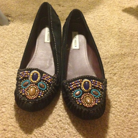 Black Steve Madden flats.