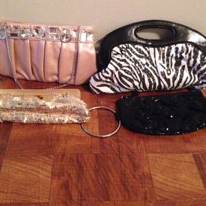 Like new clutch/ purse bundle 4 for the price of 1