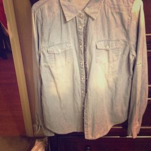 Button down denim blue sweater black top.