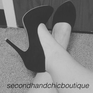 Black suede pumps
