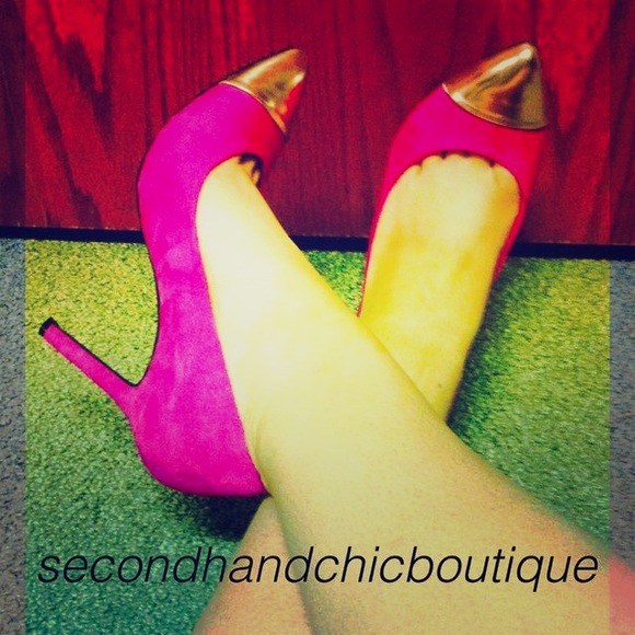 Pink pumps with gold cap toe