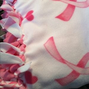 Double sided fleece blanket with knotted trim
