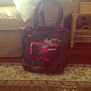 Brown and coral Jansport bag