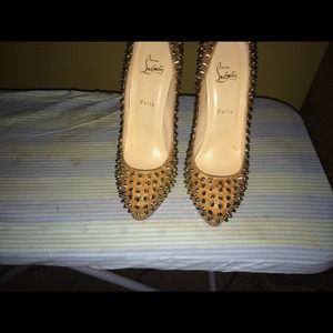Christian Louboutin...runs small...will fit 8-9