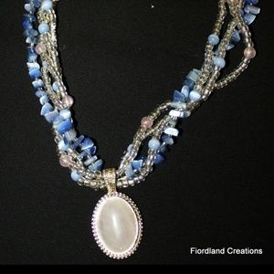 Triple strand beaded necklace