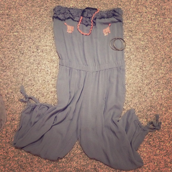 Grey Capri romper with lace detail and pockets