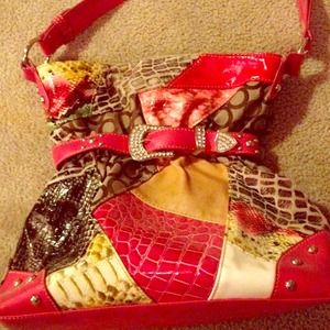 Cute and colorful handbag. In great shape!