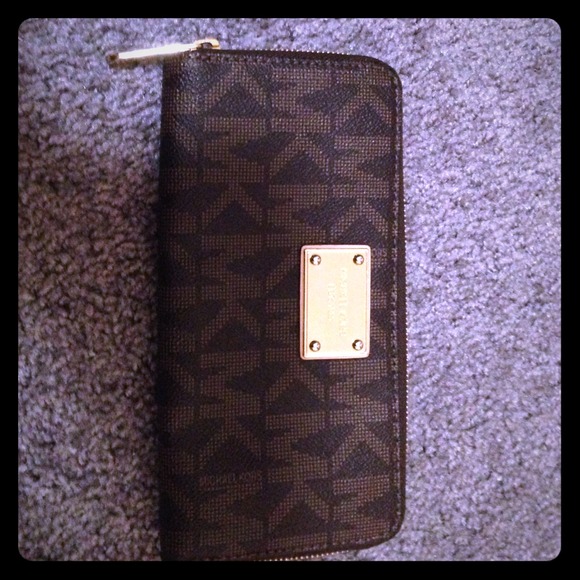 Brown mk zip around wallet w gold interior