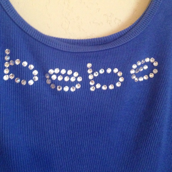 Bebe top and A&F sweater.