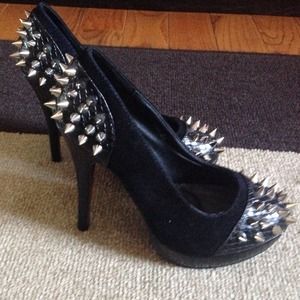 Spiked Beyond pumps in black.