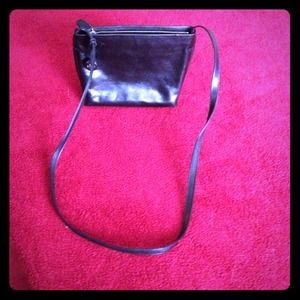 Small black, lightly used monsac cross body bag.