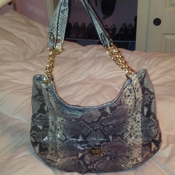 REDUCED PRICE!! A Michael kors snake print purse!