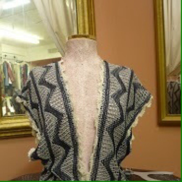 Very nice vest white and dark blue .